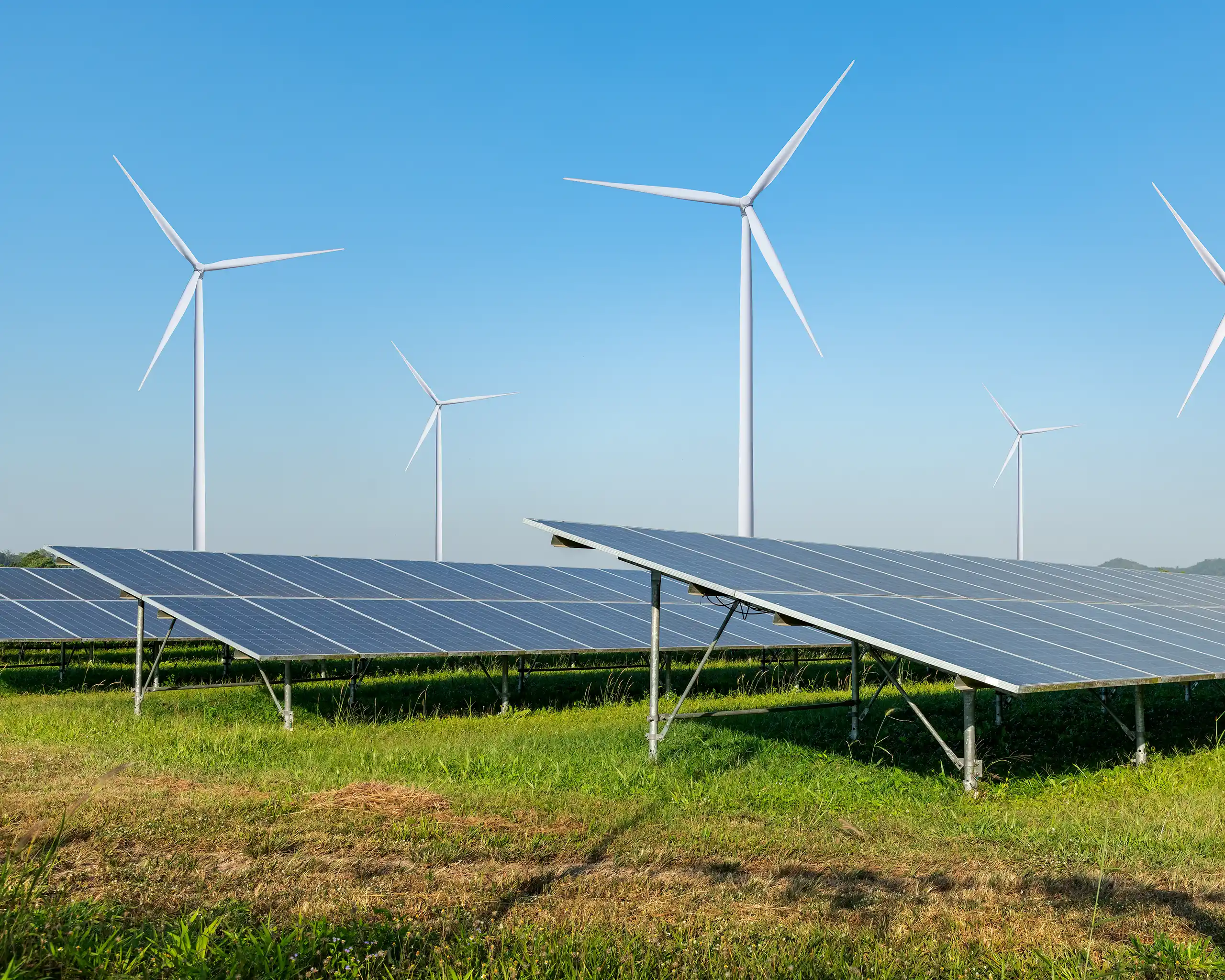 solar-panels-and-wind-turbines-on-open-field S